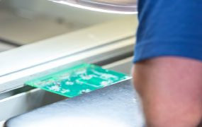 Electronic Medical Device Manufacturers viewing assembled PCB